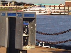 The pay phones with some other riverboat in the background