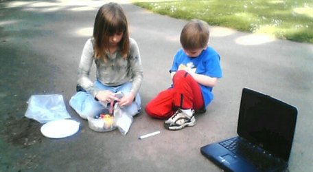 emily and payton looking at a cache