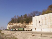 A train under the bluffs as I approach the River Road.