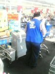 Here's a Wal-Mart greeter doing a shitty job.